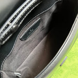 Top view of polished statement women's handbag – women's designer-style accessory