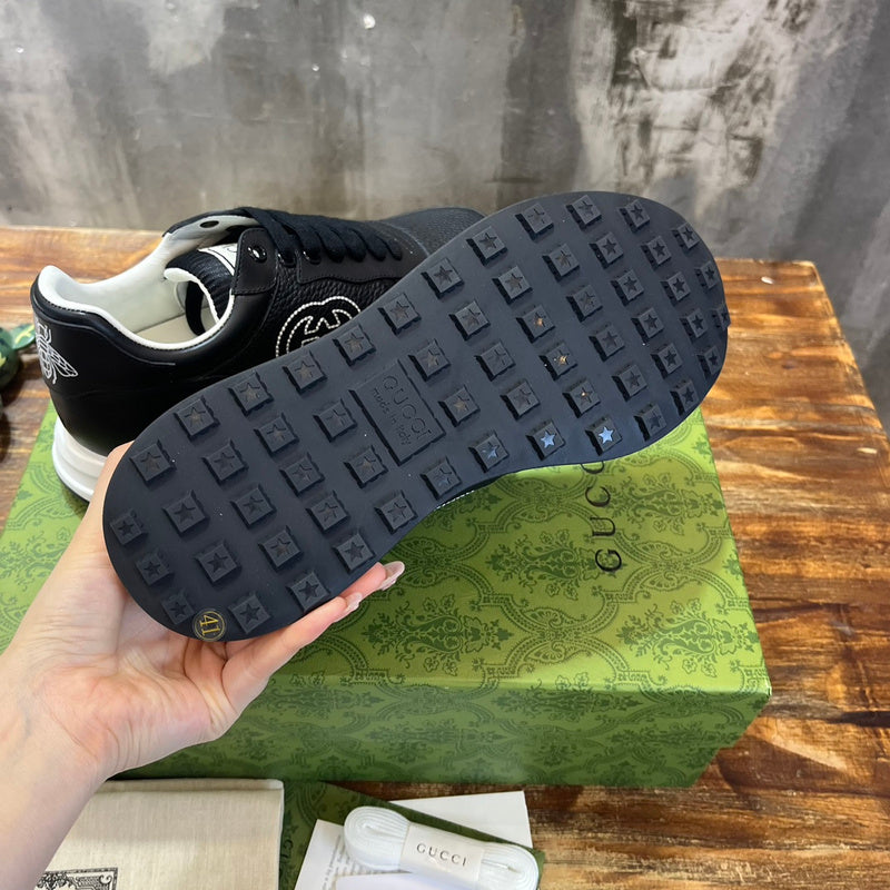 Gucci tonal black luxury sneakers view 8 bold athletic profile