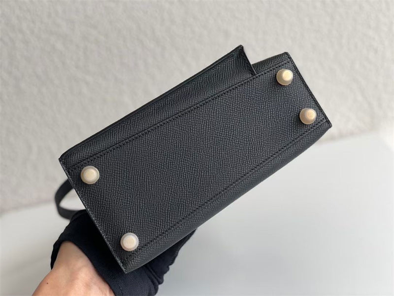  Streamlined crossbody bag carried on shoulder