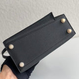  Streamlined crossbody bag carried on shoulder