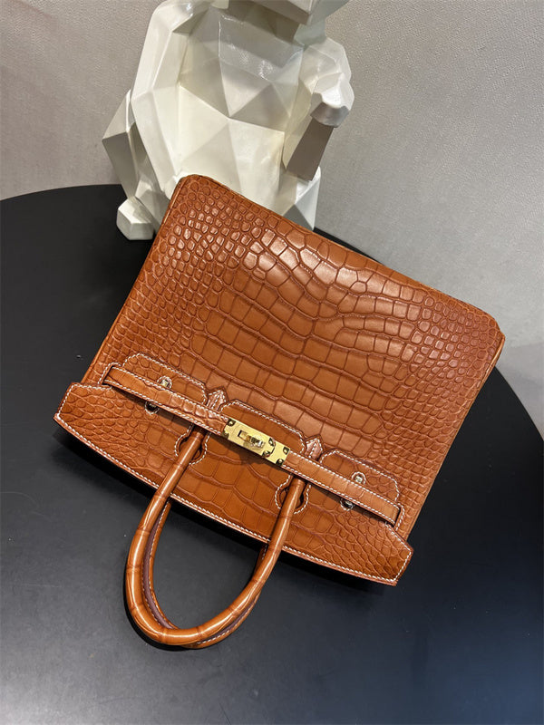  modern top-handle bag styled with outfit