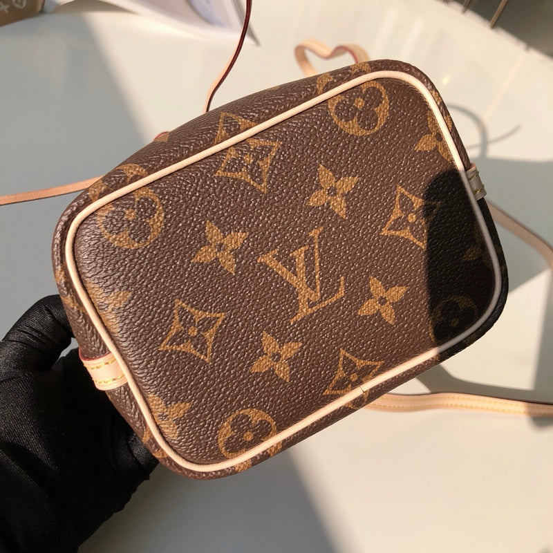 Side profile of statement polished women's handbag – women's statement bag