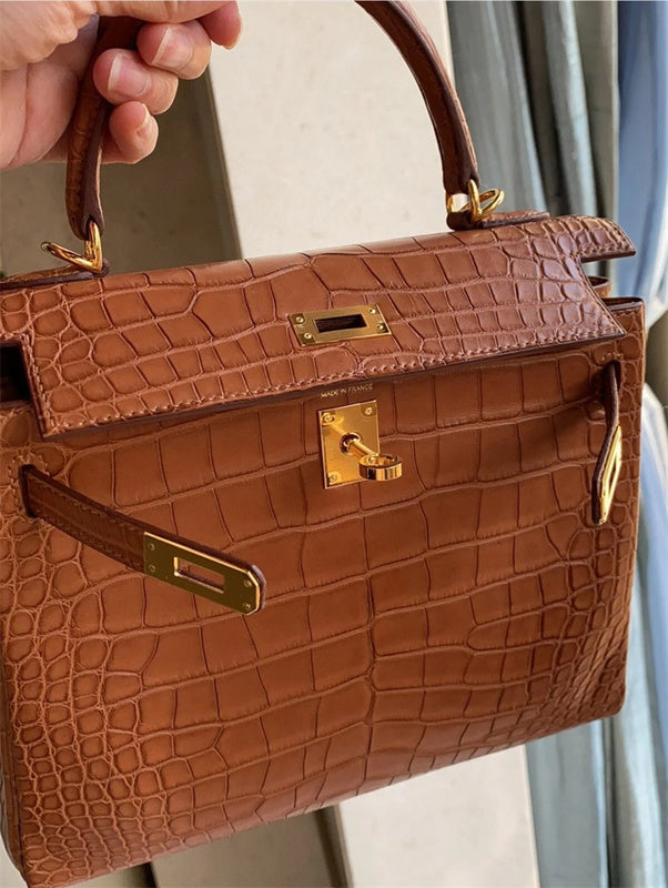  signature crossbody bag detail view showing craftsmanship 14