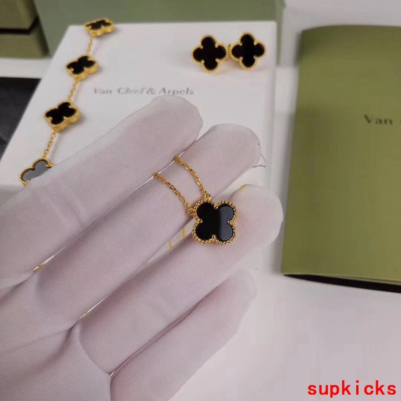 Lifestyle view of Van Cleef & Arpels unisex jewelry piece
