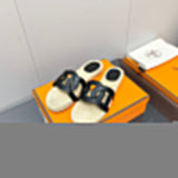 Hermes sandals Style 196 - close-up of classic monogram styling