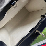 Close-up detail of refined chic women's handbag – women's statement bag