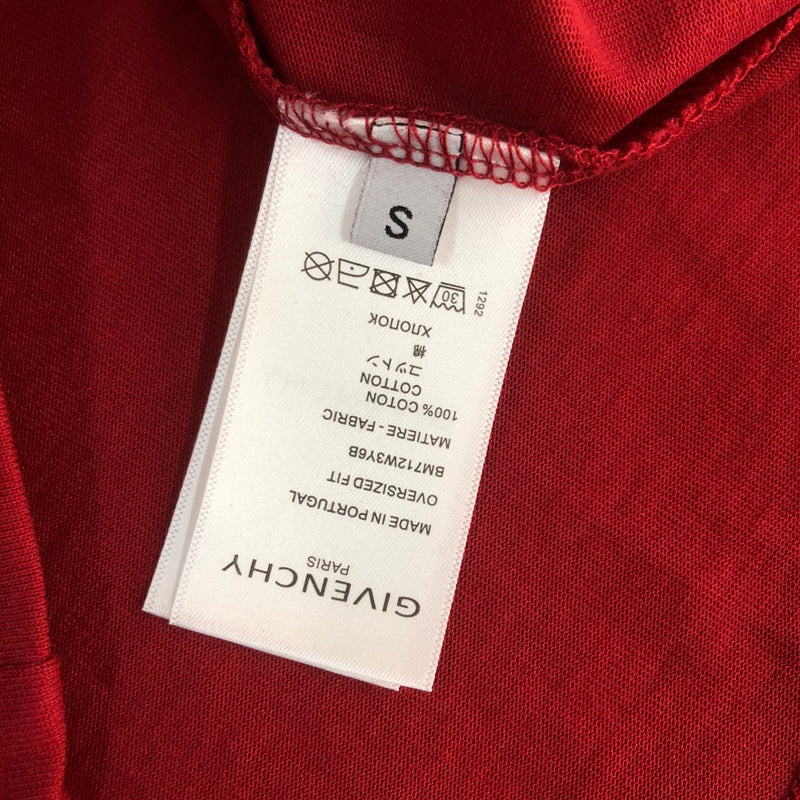 Side profile of Givenchy luxury clothing with signature branding