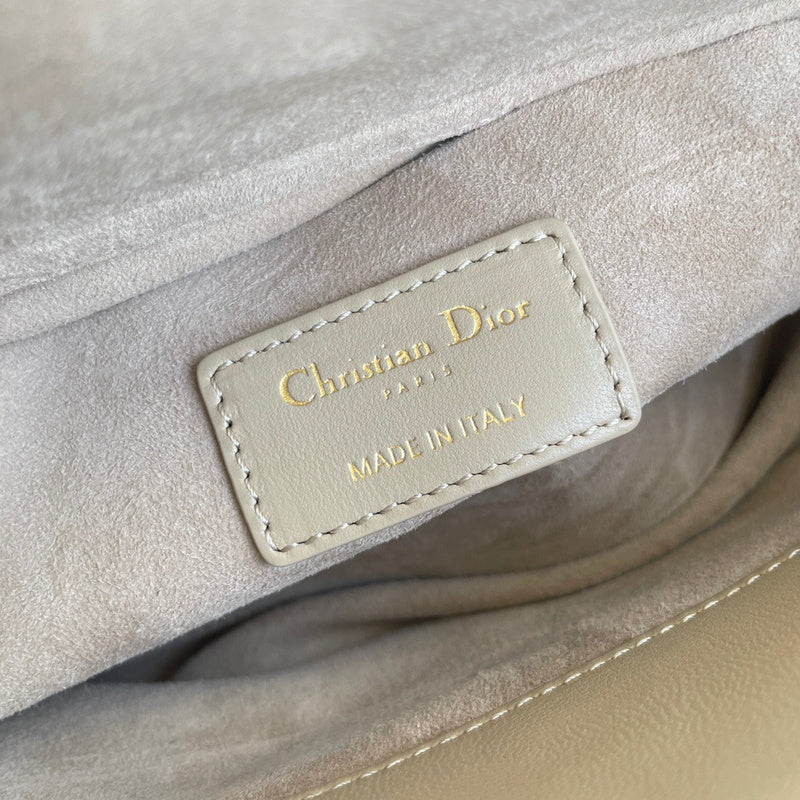Side profile of chic modern women's handbag – women's statement bag