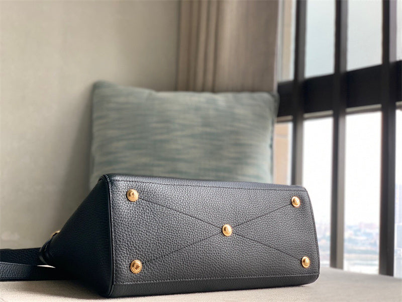  graceful top-handle bag detail view showing craftsmanship