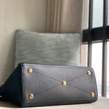  graceful top-handle bag detail view showing craftsmanship