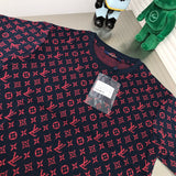 Close-up detail shot of Louis Vuitton cotton t-shirt with label-forward styling