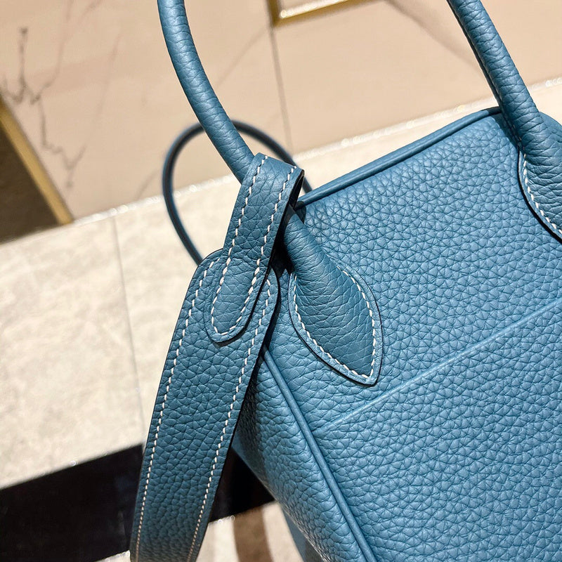 Side view of effortless structured handbag