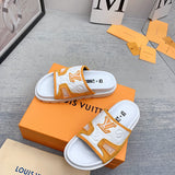 Louis Vuitton Nude Pointed-Toe Flats - Angled View