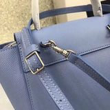 Back view of modern structured women's handbag – women's designer-style accessory