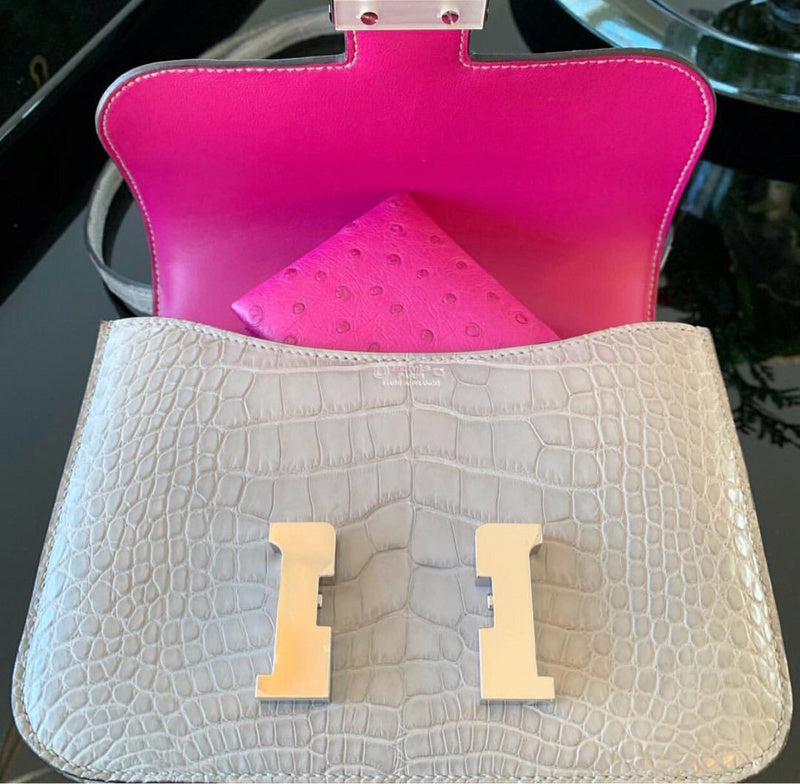 Side view of fluid structured handbag