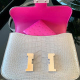 Side view of fluid structured handbag