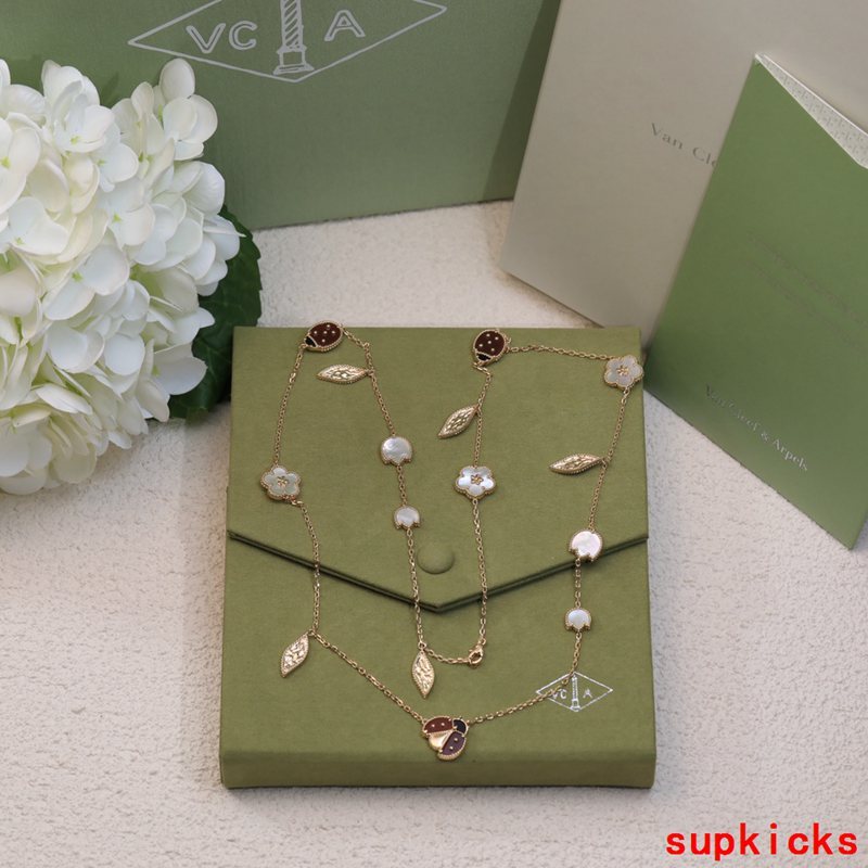Lifestyle view of Van Cleef & Arpels unisex jewelry piece