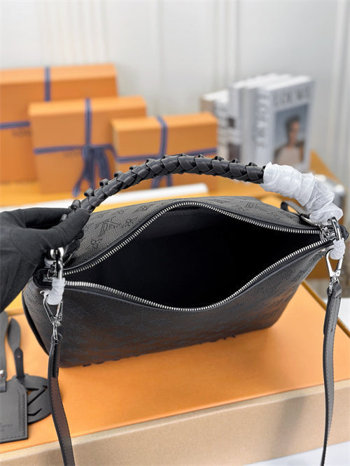  Understated crossbody bag carried on shoulder