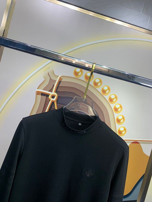 Close-up detail shot of Louis Vuitton luxury clothing with monogram-inspired silhouette