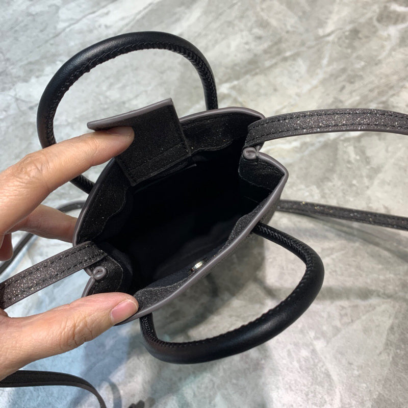 Understated Faux Leather Handbag - Refined Silhouette | Women's Statement Accessory #1058 - styled full view (image 7) of designer-inspired handbag