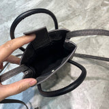 Understated Faux Leather Handbag - Refined Silhouette | Women's Statement Accessory #1058 - styled full view (image 7) of designer-inspired handbag