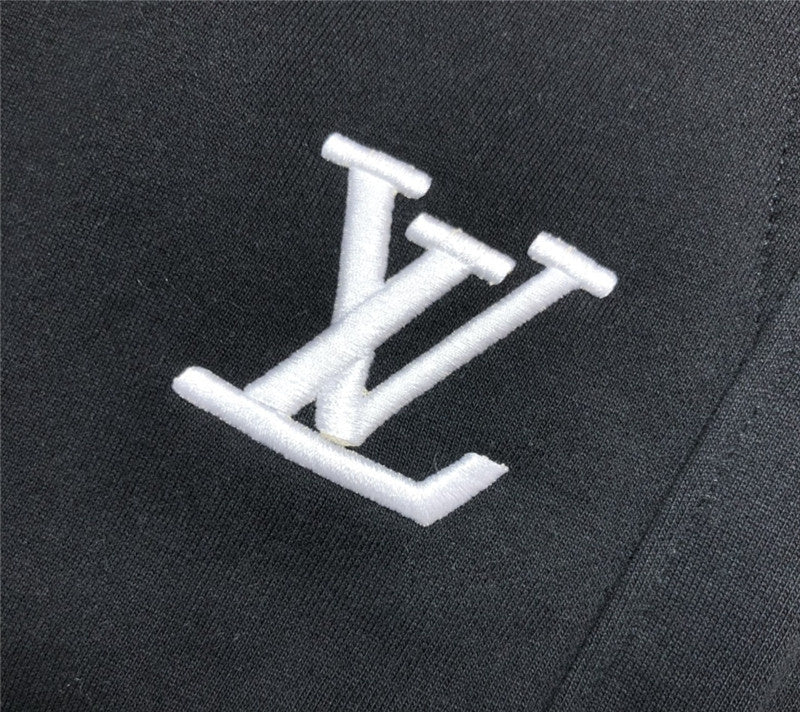 Flat lay presentation of Louis Vuitton cotton t-shirt with label-forward styling