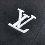 Flat lay presentation of Louis Vuitton cotton t-shirt with label-forward styling