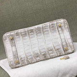 Side view of modernist structured handbag