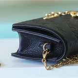  crossbody bag close-up of hardware and finish