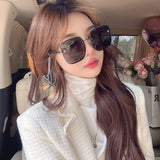 Front view of Louis Vuitton unisex sunglasses