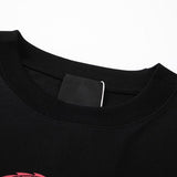 Close-up detail shot of Givenchy luxury clothing with signature branding