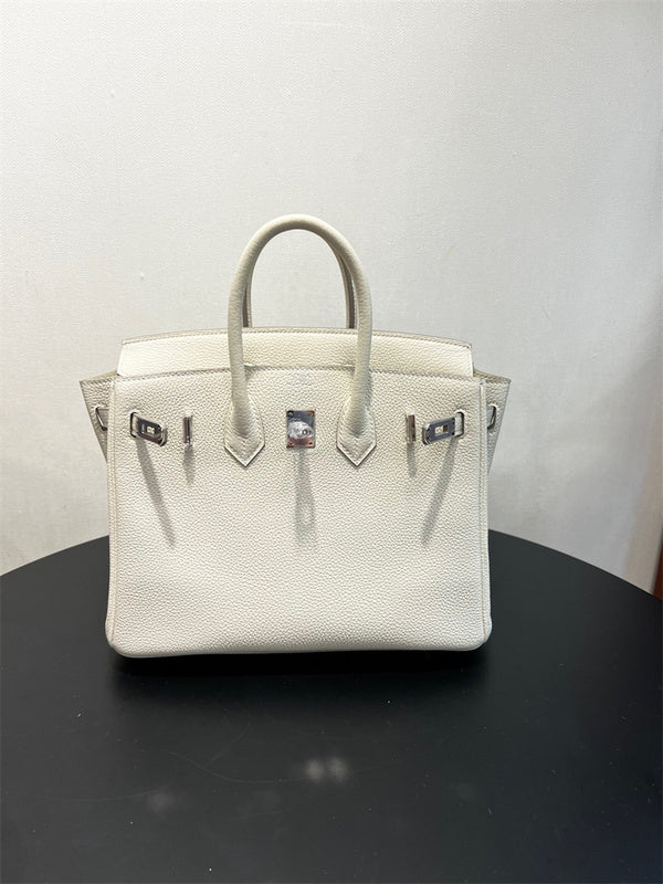  Understated handbag carried on shoulder 10