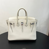  Understated handbag carried on shoulder 10