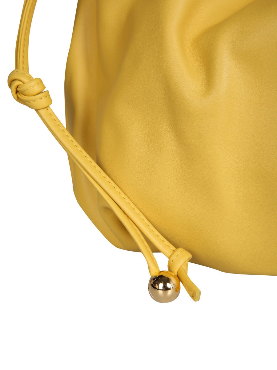 Close-up of Bottega Veneta cross body bags hardware and fine stitching