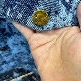 Front view of Louis Vuitton luxury clothing with logo-detail design