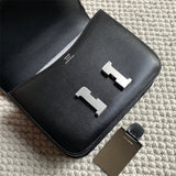 Side view of poised structured handbag