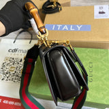 Side view of poised structured handbag