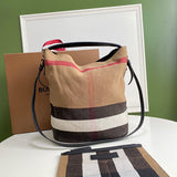 Ziva's Charm handbag – side angle view (one versatile size)