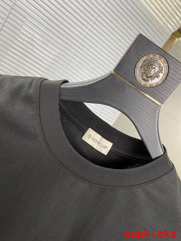 Side profile of Moncler luxury clothing with relaxed-fit cut