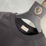 Side profile of Moncler luxury clothing with relaxed-fit cut