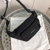 Handle and strap detail of statement polished women's handbag – women's everyday handbag