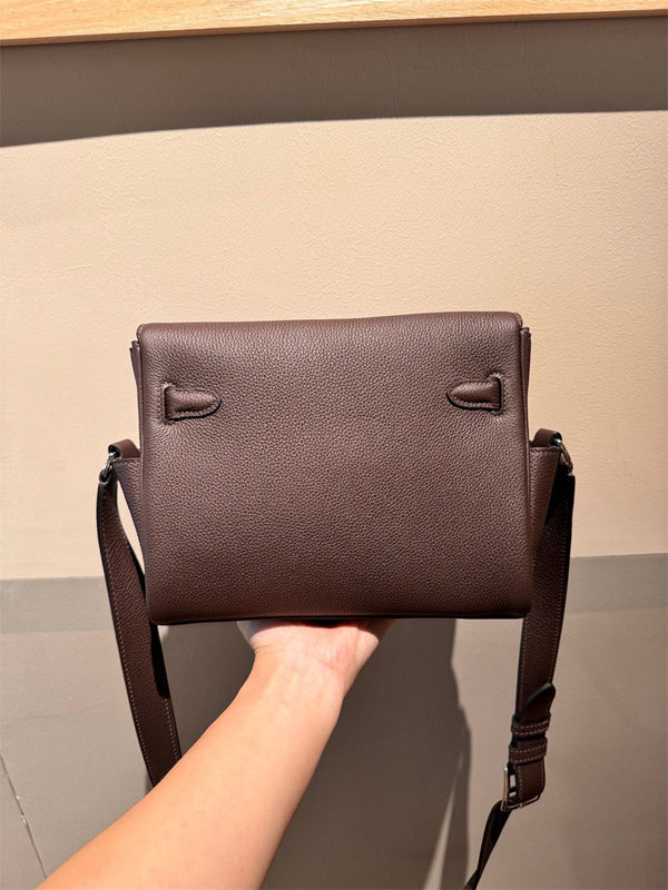 Side view of fluid structured handbag