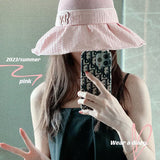 Close-up detail view of Louis Vuitton unisex cap