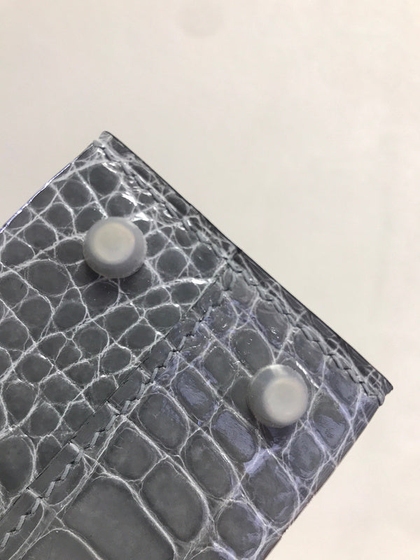 Side view of clean-lined structured handbag