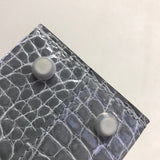 Side view of clean-lined structured handbag