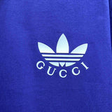 Full styled look of Gucci luxury clothing with logo-detail design