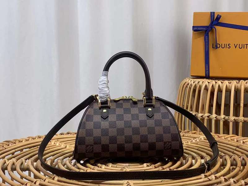 Front view of elevated polished women's handbag – women's luxury accessory