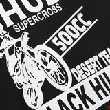 Close-up detail shot of Rhude luxury clothing with signature branding