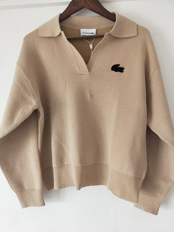 Full styled look of Lacoste luxury clothing with monogram-inspired silhouette