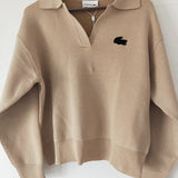 Full styled look of Lacoste luxury clothing with monogram-inspired silhouette